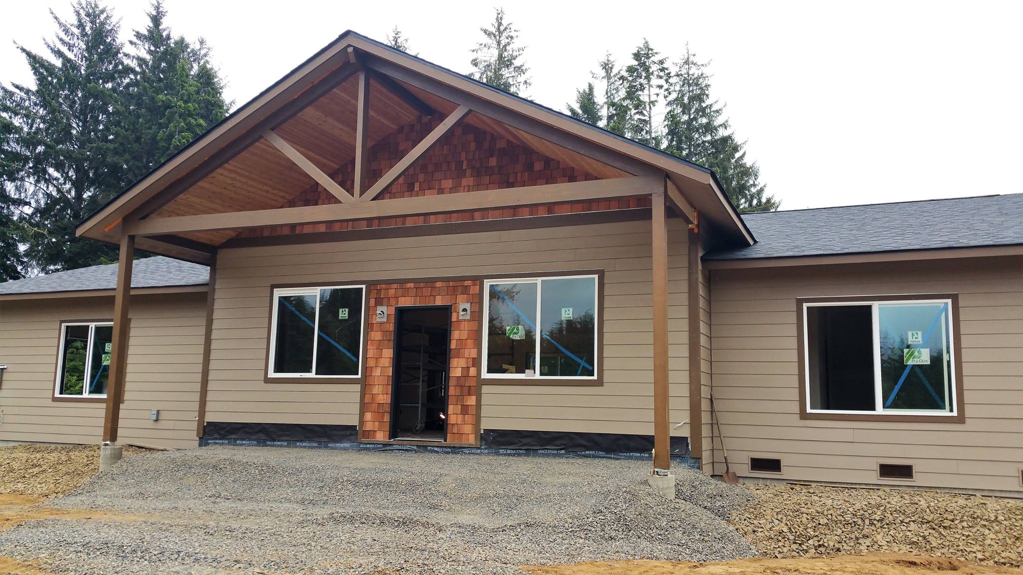 Hardi-board siding, new windows and doors on new construction project in South Bend, WA.